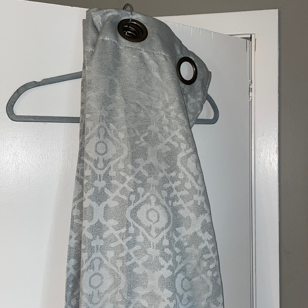 2 Light Blue Curtain Panels Like New 85” long.